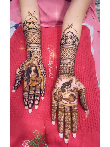This baby shower mehendi features portraits of Radha and Krishna, symbolizing divine love and blessings for the new baby.