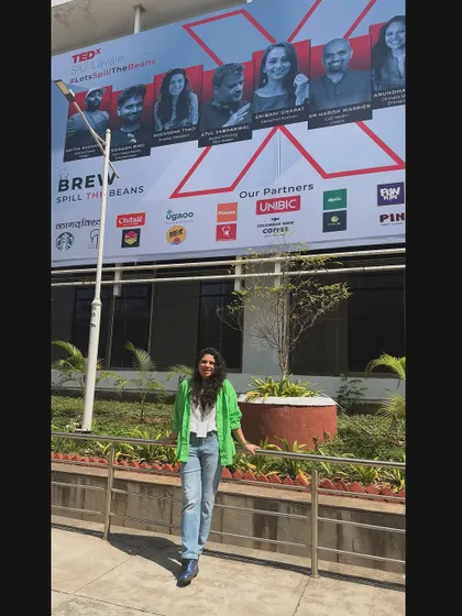 Standing in front of the giant banner for the TEDx event, with my face right up there with the other incredible speakers. A true 'who would have thought' moment for me.