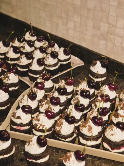 Another view of the Black Forest cupcakes. I pay close attention to making sure each one is perfectly assembled, so your guests get a consistent and delicious experience.