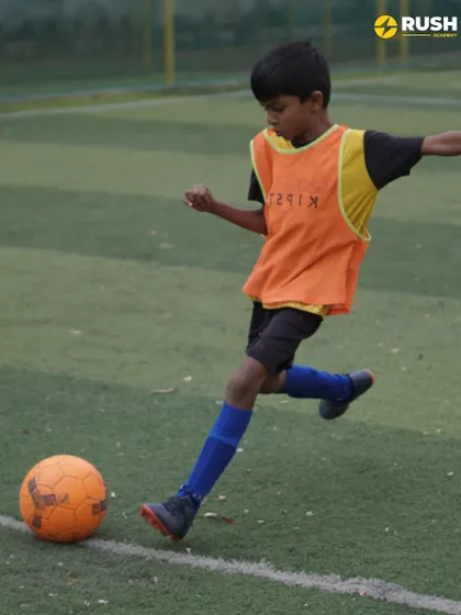 A player practices his shooting form during a training session.