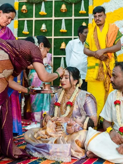 A moment of blessing during a traditional Seemantham ceremony. I focus on capturing the cultural significance and emotional depth of these family events.