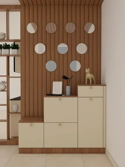 A playful and modern foyer design with a stepped shoe cabinet and a wall of circular mirrors. The wooden partition adds warmth and texture.