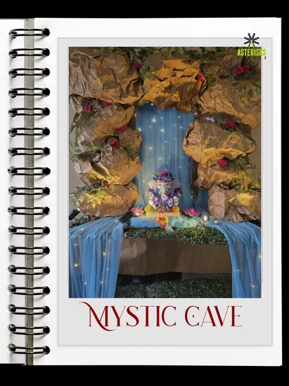 A "Mystic Cave" theme for Ganpati decor. We used craft paper and fairy lights to create an enchanting cave-like setting, adding a touch of magic to the festive occasion.