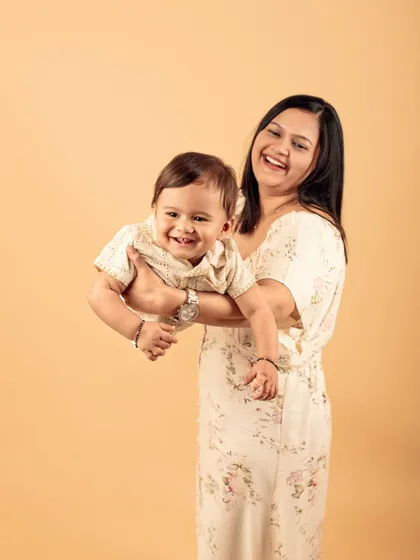 (Hero Item) I love capturing the pure joy between a mother and child. This studio session was all about their natural laughter and connection, creating a timeless memory.