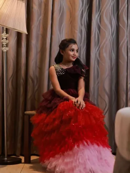 Another beautiful shot of the birthday girl, showing the full range of colors in her gown.