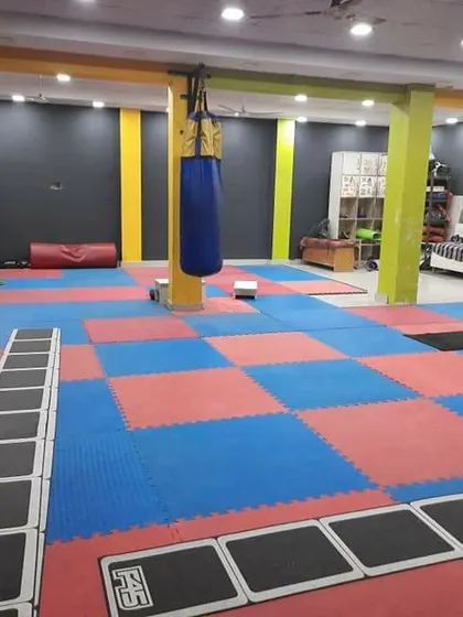 Another angle of our well-equipped dojang and gym space, showing the agility ladders and other tools we use for developing speed and coordination.