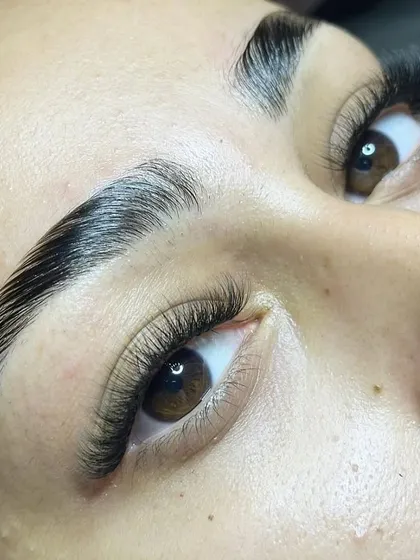 A close-up of freshly laminated brows and a new lash set. This combo is a game-changer for a polished, put-together look.