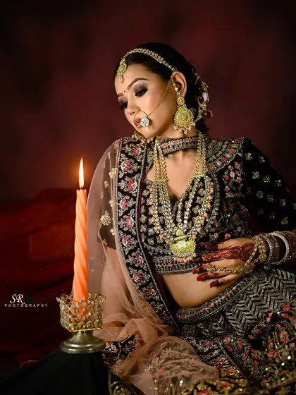 An atmospheric bridal portrait with a candle, creating a moody and romantic vibe that highlights the bride's features.
