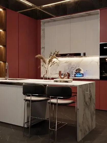 This bold kitchen design pairs deep red cabinets with a white marble island and backsplash. The integrated shelving with backlighting adds a touch of elegance and provides a beautiful display area.