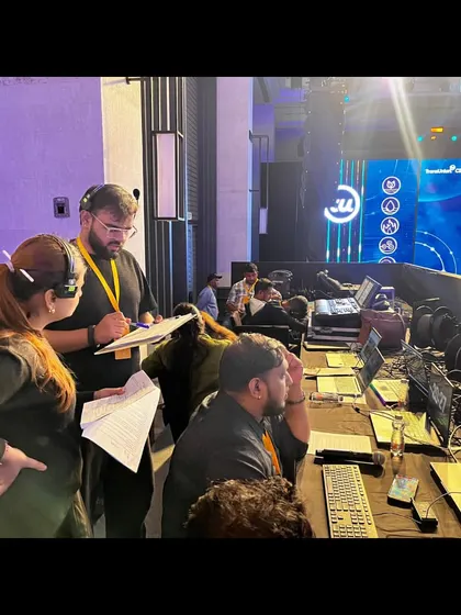 A team discussion at the console during the TransUnion CIBIL event. We work collaboratively to solve problems in real-time.