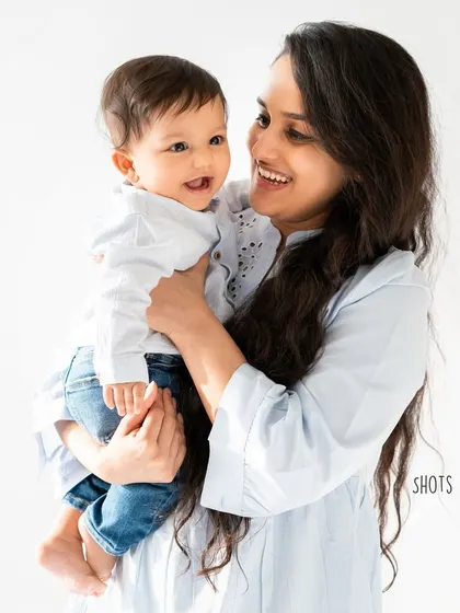 A before and after comparison, showing how quickly they grow. This mom and her son, photographed a year apart, is a powerful reminder to capture these moments before they're gone.