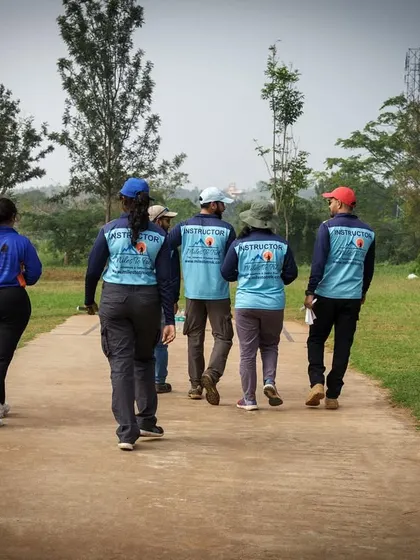 Our team of instructors on the move, ensuring everything runs smoothly during a large corporate engagement day. We are always on the ground to manage the event.