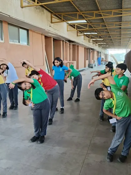 Coordinated group stretching ensures every student is properly warmed up. We guide them through each movement to ensure they perform it safely and effectively.