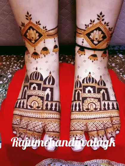 A stunning foot design with palace architecture and jhumkis, perfect for a royal bride.