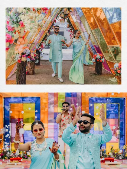 The couple's energetic entry and dance at their Haldi, set against a vibrant, multi-colored glass backdrop.