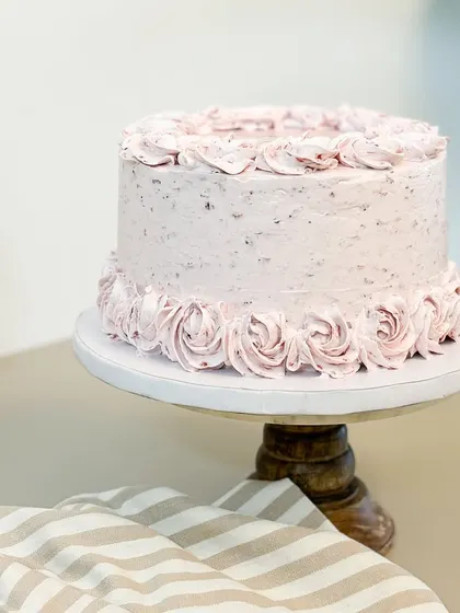 This is our soft vegan vanilla cake, layered with our own homemade strawberry jam. It's a guilt-free treat that is pure love in every single bite.