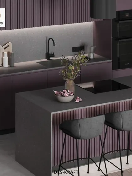 A detailed shot of the plum kitchen, highlighting the under-cabinet lighting, terrazzo-style countertop, and integrated appliances that maintain the sleek aesthetic.