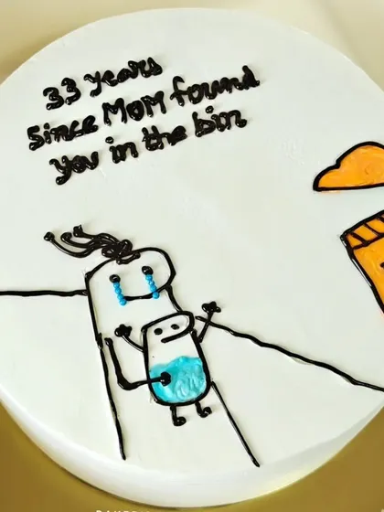 Another look at the "bin baby" cake. It's a perfect example of how a cake can be part of a fun inside joke between family members.