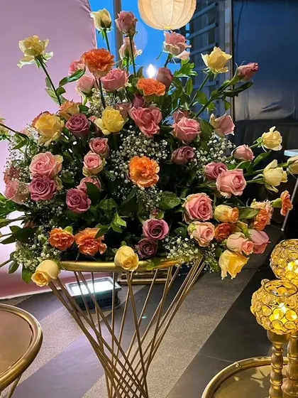 Another close up of the beautiful, fresh flower arrangements used to add a touch of natural elegance to the 25th birthday decor.