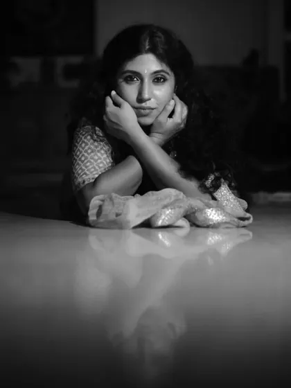 A quiet, reflective black and white portrait. These moments of introspection are as much a part of my dance practice as the physical training.