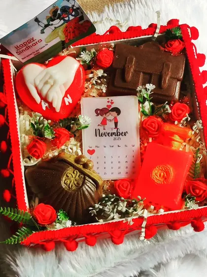 A closer look at the Sindhara hamper, showing the detail on the handmade couple's soap and the other themed items.