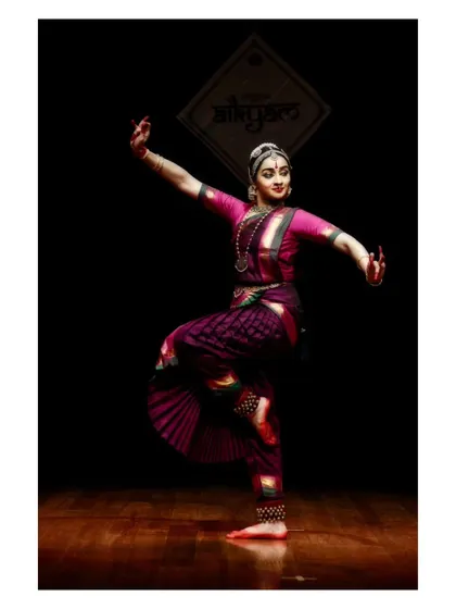 A dynamic pose from a pure dance sequence, showcasing the intricate footwork and rhythmic patterns of a Thillana.