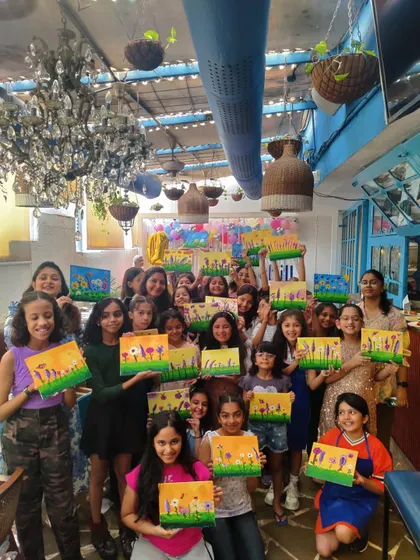 Look at all these proud young artists. This was from Nishka's 10th birthday party, where the kids painted their own floral masterpieces on canvas. My parties for children are all about having fun with colors and taking home a piece of art they created themselves.