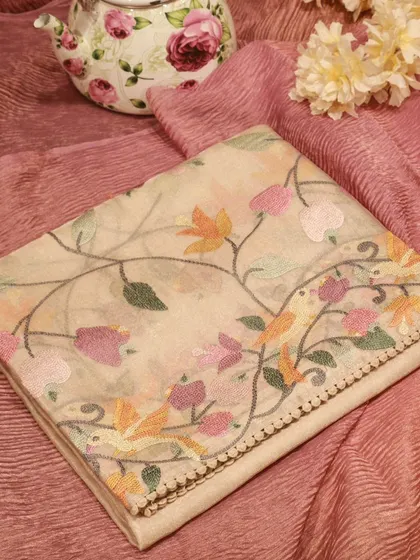 Another color variation of the Paithani embroidered tissue silk saree.