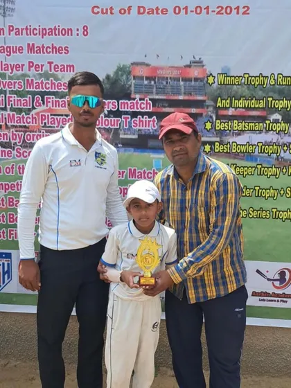 Abhay Dahiya receiving his Man of the Match award at a junior tournament.