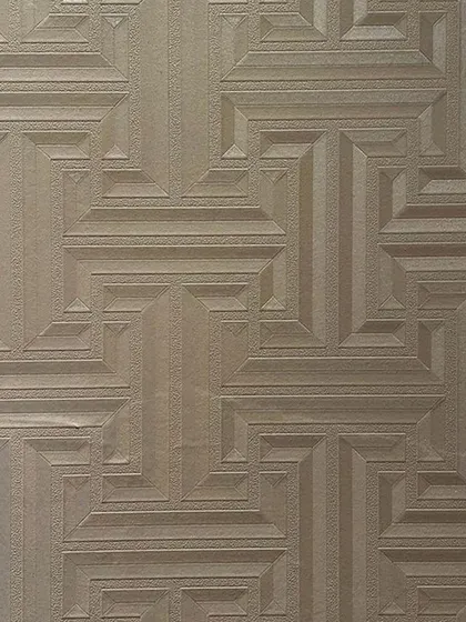 This geometric textured wallpaper adds a subtle art deco vibe and a sense of depth to the space.