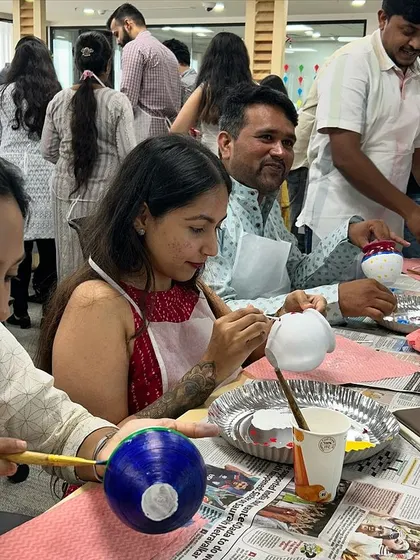 So much focus and creativity in one room! Pot painting is a relaxing and meditative activity that allows for individual expression within a group setting.