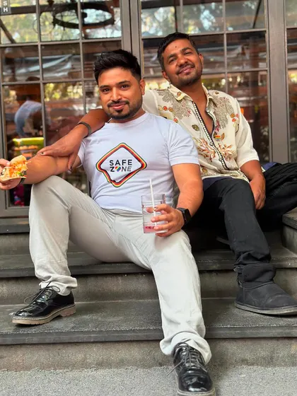 A candid moment with my partner. Our bond is the foundation of the love and community we aim to build in our classes.