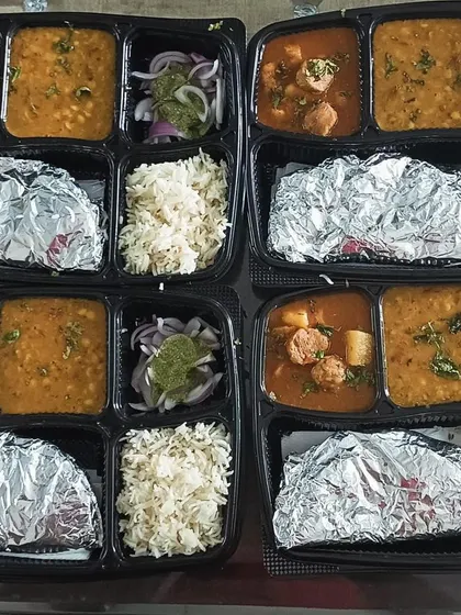 Showcasing two different thalis for the day. One with jeera aloo and dal tadka, and the other with soya aloo curry and dal tadka, offering choice to my customers.