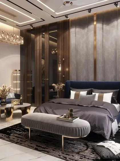 A master bedroom should be a personal sanctuary. In this Rohtak residence, I combined rich wood tones, plush fabrics, and sophisticated gold accents to create a space that is both opulent and deeply comfortable, complete with a dedicated seating area for quiet moments.