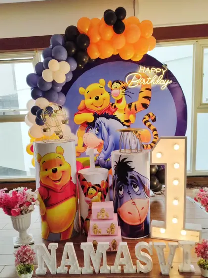 A classic Winnie the Pooh first birthday, featuring all the beloved characters from the Hundred Acre Wood.