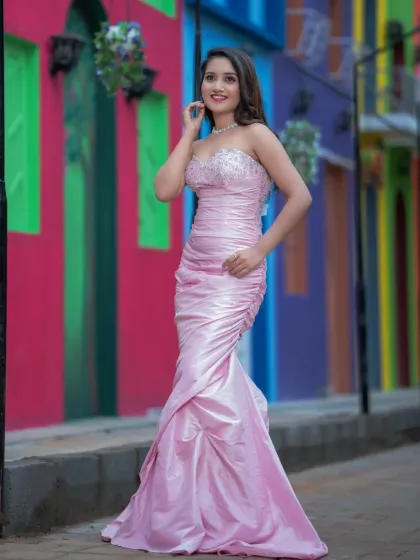 A happy and confident pose. This look is perfect for a reception, cocktail party, or any formal event.