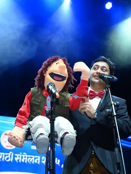 On stage in Leicester with my main partner, the puppet Bunty. This show was special because my wife and daughter also performed.