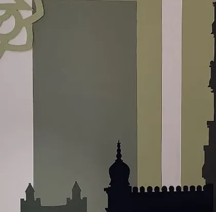 A close-up showing the combination of painted brick texture, mandala graphics, and architectural silhouettes.