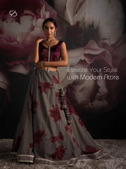 Elevate your style with modern attire. This grey and red lehenga is a perfect choice for bridesmaids or for attending a festive sangeet night.