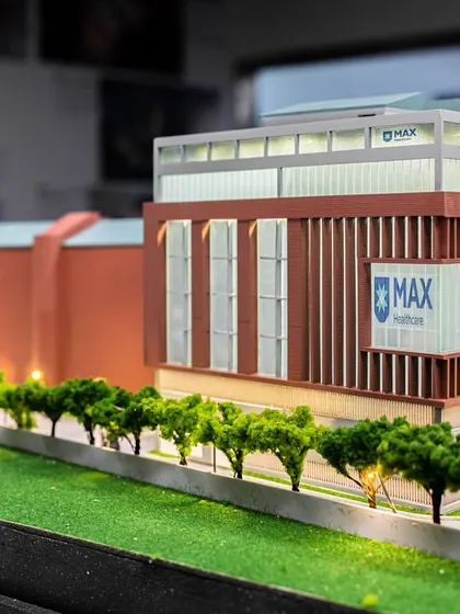 This architectural model shows the Max Hospital expansion in Mohali, which called for a 200-bed addition on an active site. The new block connects to the existing facility via sky bridges, ensuring seamless integration.