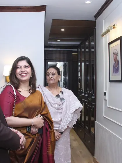 Explaining the thought process behind the art and decor choices to the Honourable Governor. It's a wonderful feeling when the passion behind the work is recognized.