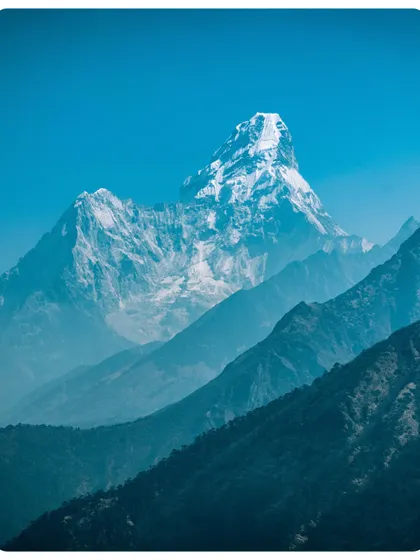 The stunning, unmistakable pyramid of Ama Dablam, one of the most beautiful mountains in the Everest region. This view is a constant companion on the EBC trek.