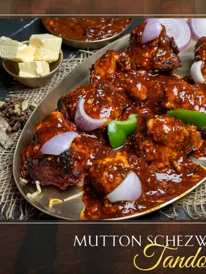 A fusion of flavours you must try: Mutton Schezwan Tandoori. I take tender tandoori mutton pieces and toss them in a bold, spicy Schezwan gravy with chunks of onion and capsicum. It’s the perfect blend of Indian smokiness and Chinese spice.