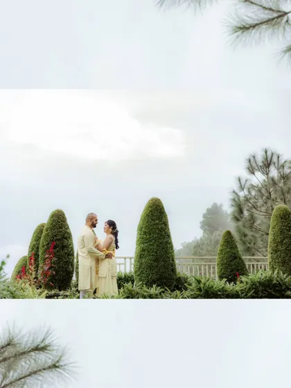 A wide-angle shot of Niharika and Aaron during their Haldi in Solan. Using this perspective allows me to capture not just the couple, but also the beautiful, manicured landscape of the venue.