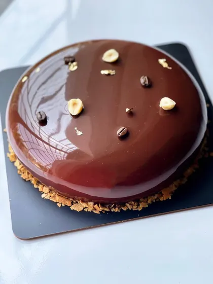 A top-down view of the stunning Coffee Hazelnut entremet.