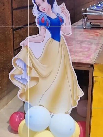 I also offer classic Disney princess themes, like this Snow White cutout. It's a life-sized prop that can be placed at the entrance or next to the cake table to delight the birthday girl.