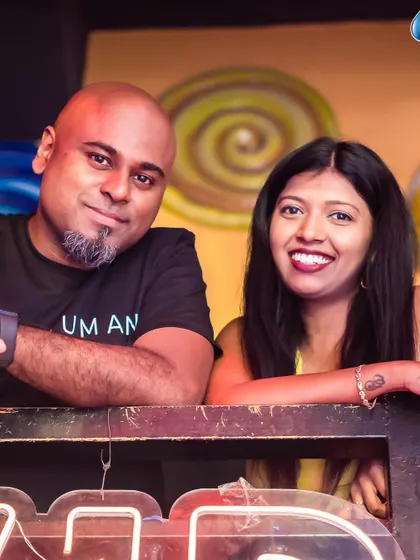 Posing with a guest by the DJ booth.