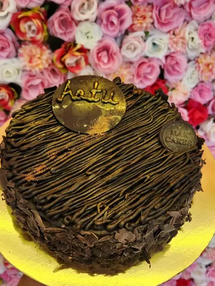 My exclusive Brownie Cake, which combines the fudgy texture of a brownie with the look of a celebration cake.