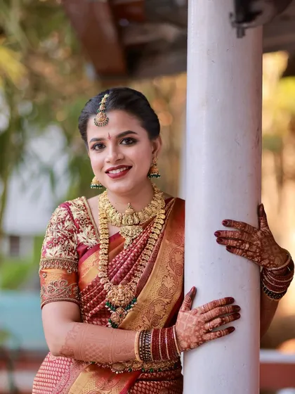 A playful and happy portrait of the bride. Her makeup is designed to look great from all angles and in all lighting.