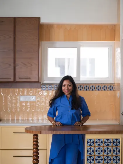 A duplicate of image 43, a portrait of me in a newly designed kitchen.